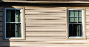 complete remodeling project of vinyl siding with brand new windows